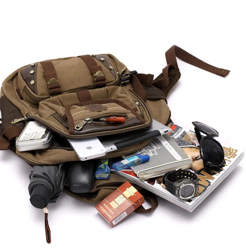 Large canvas travel backpack with air cushion strap in black, 20-35L capacity, front pocket visible
