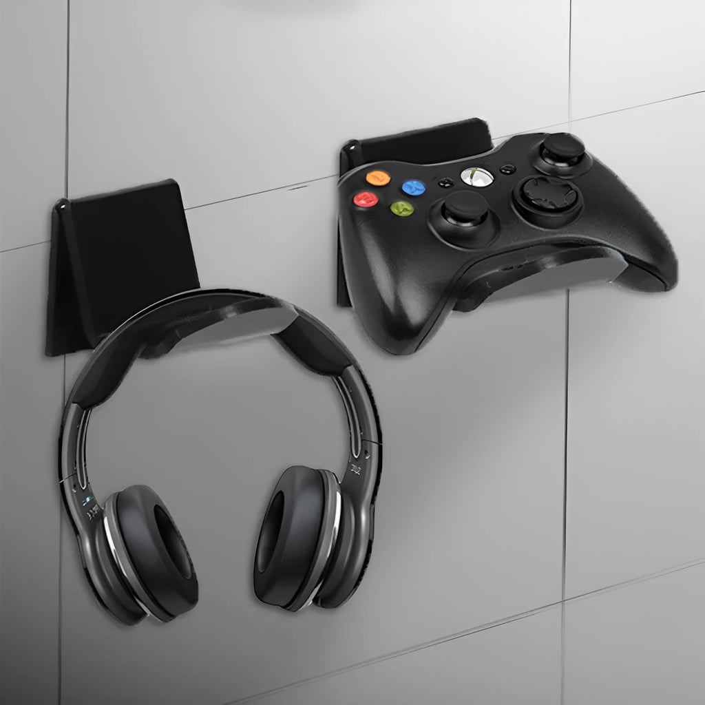 Universal plastic game controller bracket in black colour showing mounting points for installation