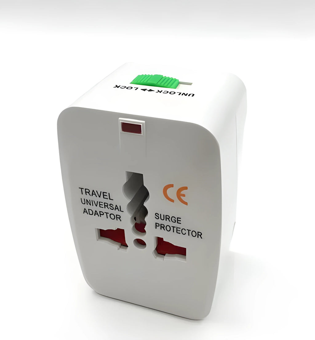 Universal travel plug adapter showing UK, US, EU, and AU pins with dimensions 73x50x39 mm.