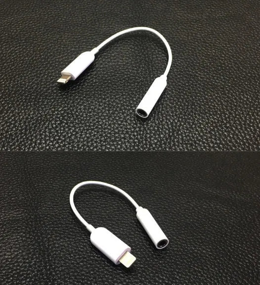 White Lightning to 3.5mm audio adapter cable with a short black TPU rubber cord.