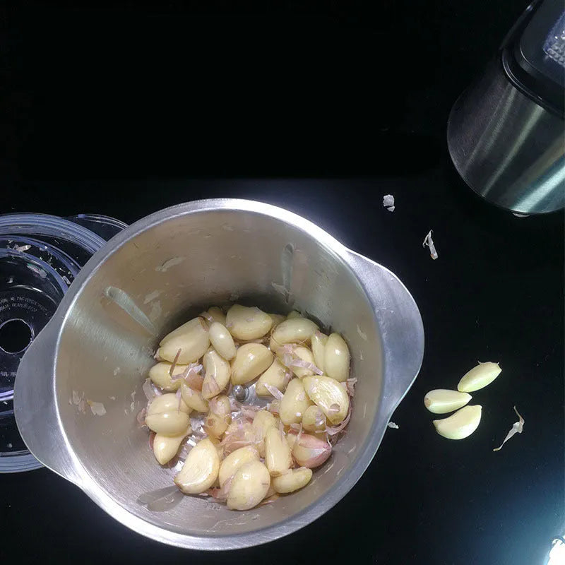 LONG PLUS white electric garlic peeler appliance on a kitchen countertop