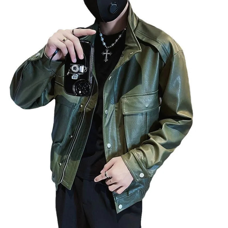 Man wearing a black Korean-style PU leather pilot jacket with a straight hem and side seam pockets.