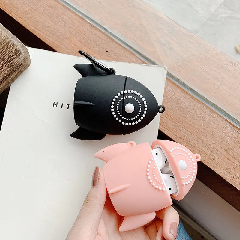 Pink silicone protective case on an AirPods wireless charging case.