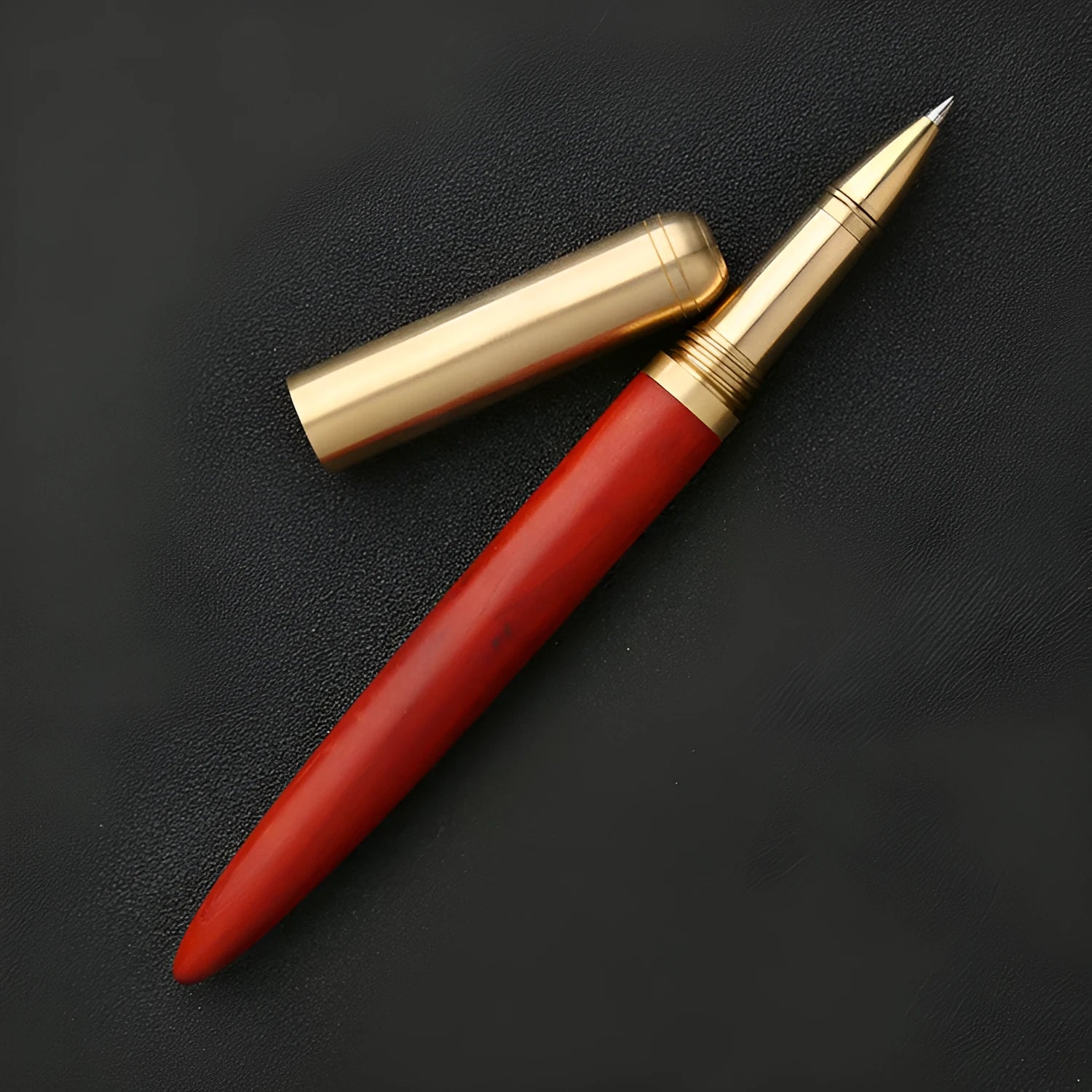 Brass and sandalwood signature pen showing wood grain and metal details at 14cm length