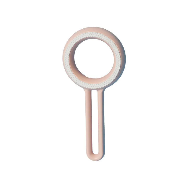 Double-sided pet hair removal brush in blue with ABS and TPR material, round shape on white background.