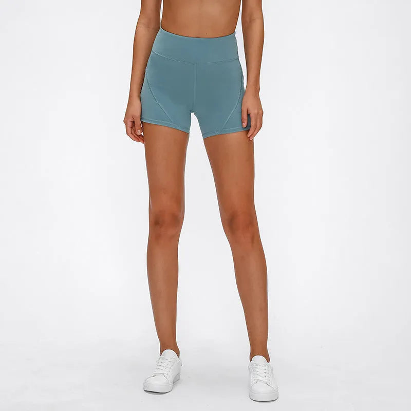 SHINBENE high waisted women's athletic shorts in black with two side pockets, soft cotton blend fabric