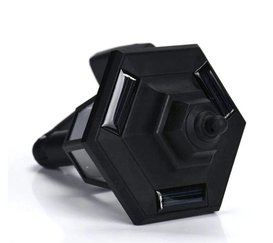 Black hexagonal solar-powered wall lamp for outdoor garden use.