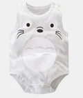 Newborn baby wearing a sleeveless 100% cotton vest romper with a colourful animal print.