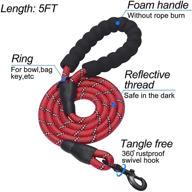 Reflective nylon dog leash with traction belt and chest strap in black and pink, sizes S to XL.
