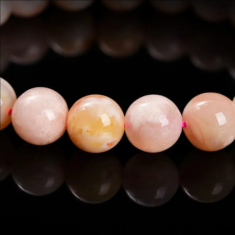 Natural cherry agate bracelet with geometric design and round elements in sweet style for women