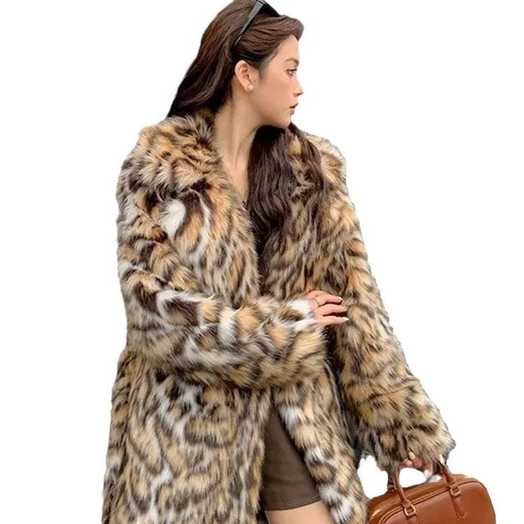 A woman's long faux fur coat with a fur collar in a street fashion style.