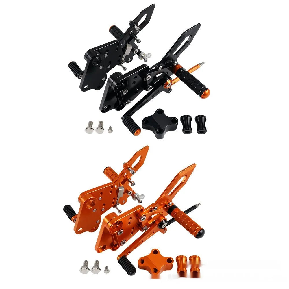 Black and orange KTM DUKE motorcycle footpeg bracket assembly for 125 200 250 390 models