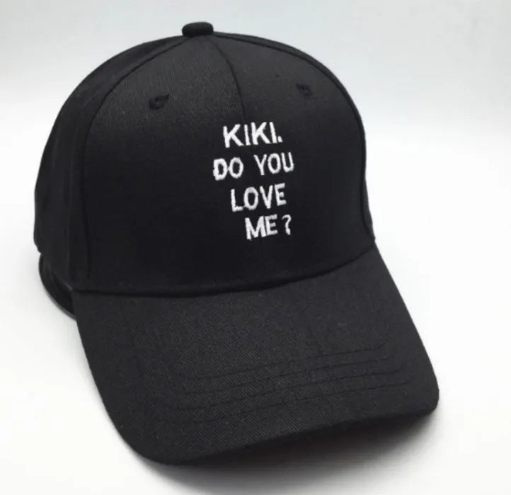Black cotton baseball cap with white letter embroidery, curved brim, adult size