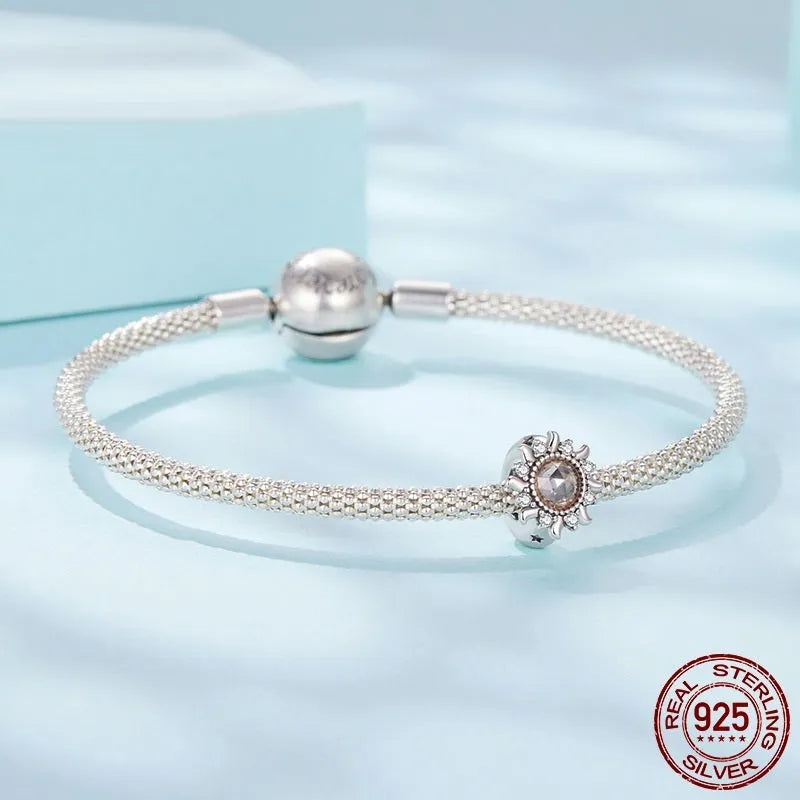 S925 sterling silver sunflower spacer bead with silicone positioning, 0.9cm height and width, 0.45cm aperture, on white background