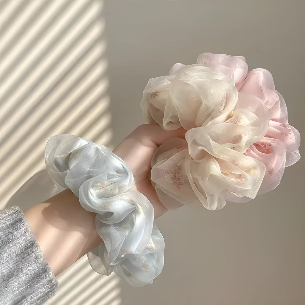 Mesh sense bun cloth hair band for women in milky white, pink, and light blue with large intestine style