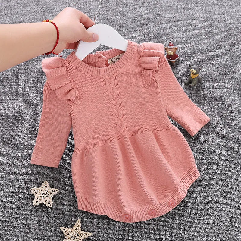 Baby girl's pink cotton princess romper with placket closure