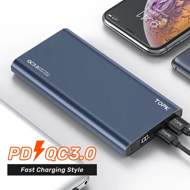 Silver 10,000 mAh fast charging power bank with digital display and metal shell on white background