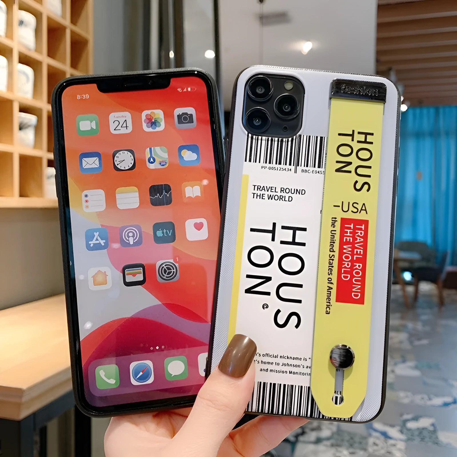 Red mobile phone case for iPhone with attached wristband showing back cover design