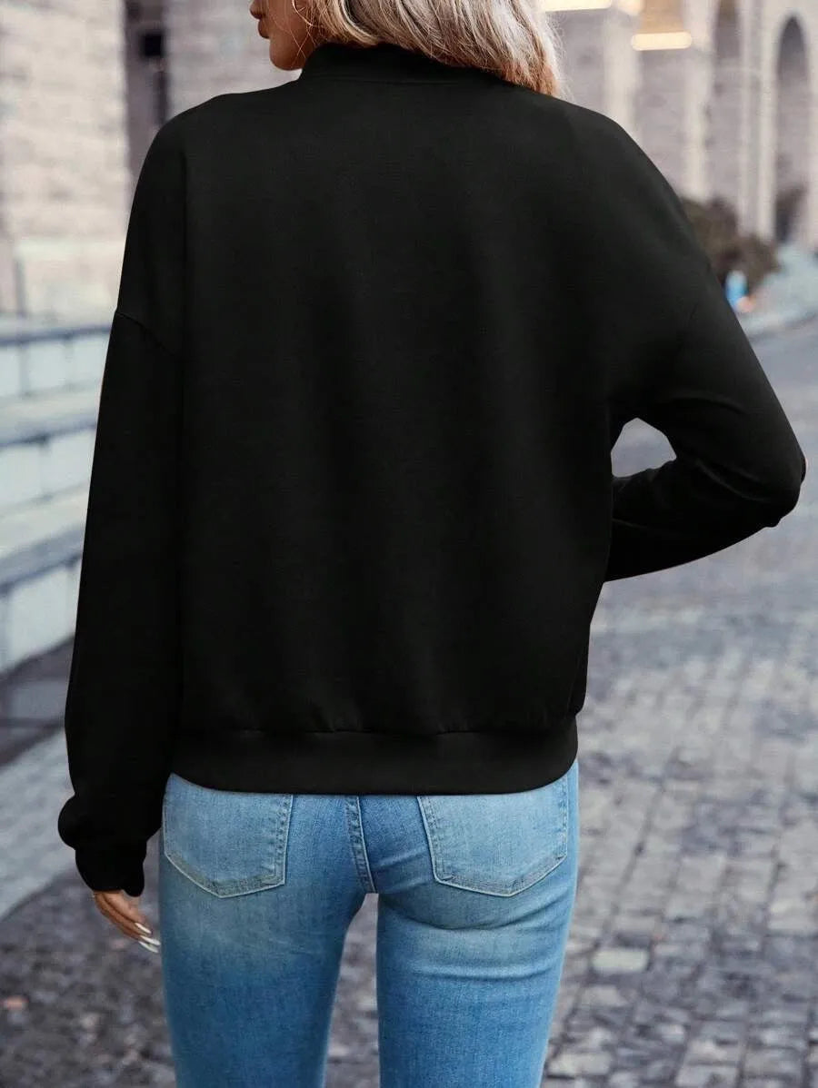 Women's solid black faux pocket zip jacket with long sleeves for casual autumn winter wear
