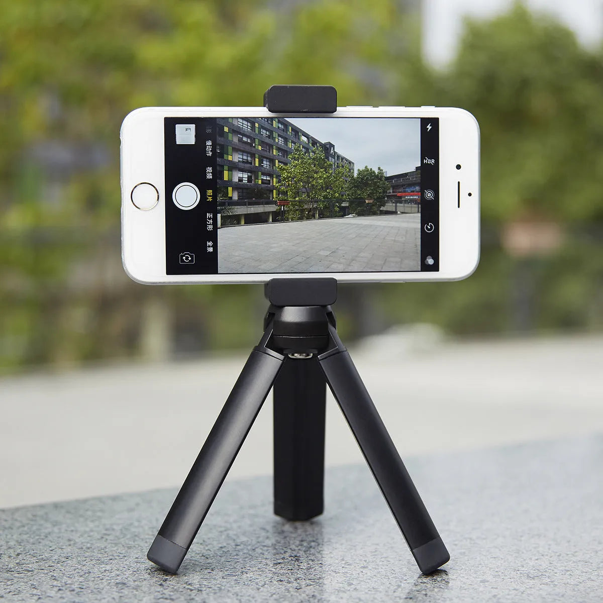 Aluminium smartphone bracket accessory for table top tripod, compatible with Apple iPhone models.