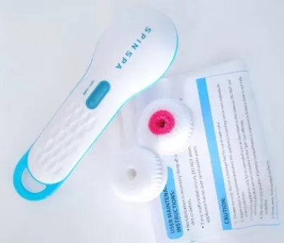Electric facial cleanser in white and blue with mild brush surface, 14x6x21cm, for deep cleaning and gentle exfoliation