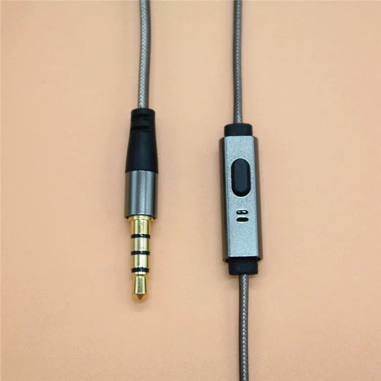 Titanium grey metal in-ear earphones with a braided aluminium foil and TPE cable and detachable connectors.