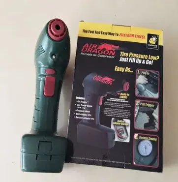Compact black 12V portable car tyre inflator with digital display screen and LED light.