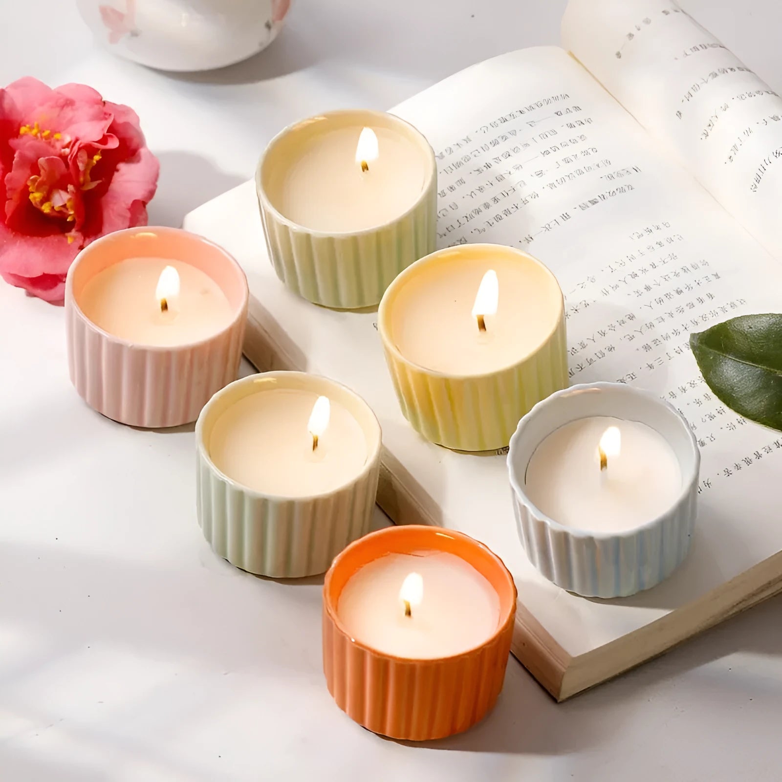 Indoor soy aromatherapy candle in ceramic cup, available in twelve scents and six colours