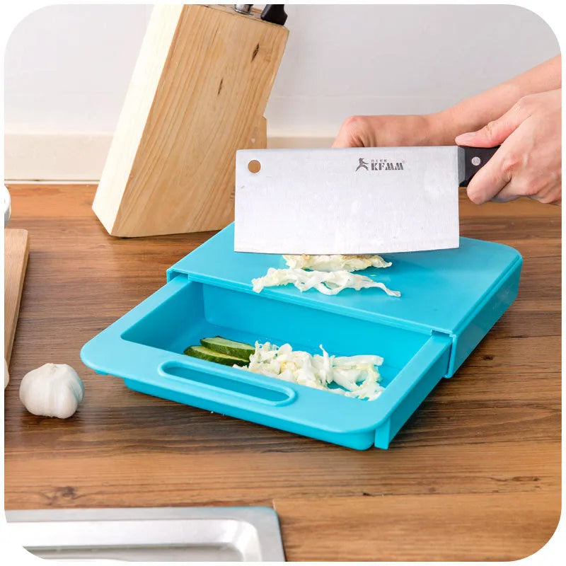 Blue multifunction kitchen chopping board with integrated plastic sink drain basket for vegetable preparation
