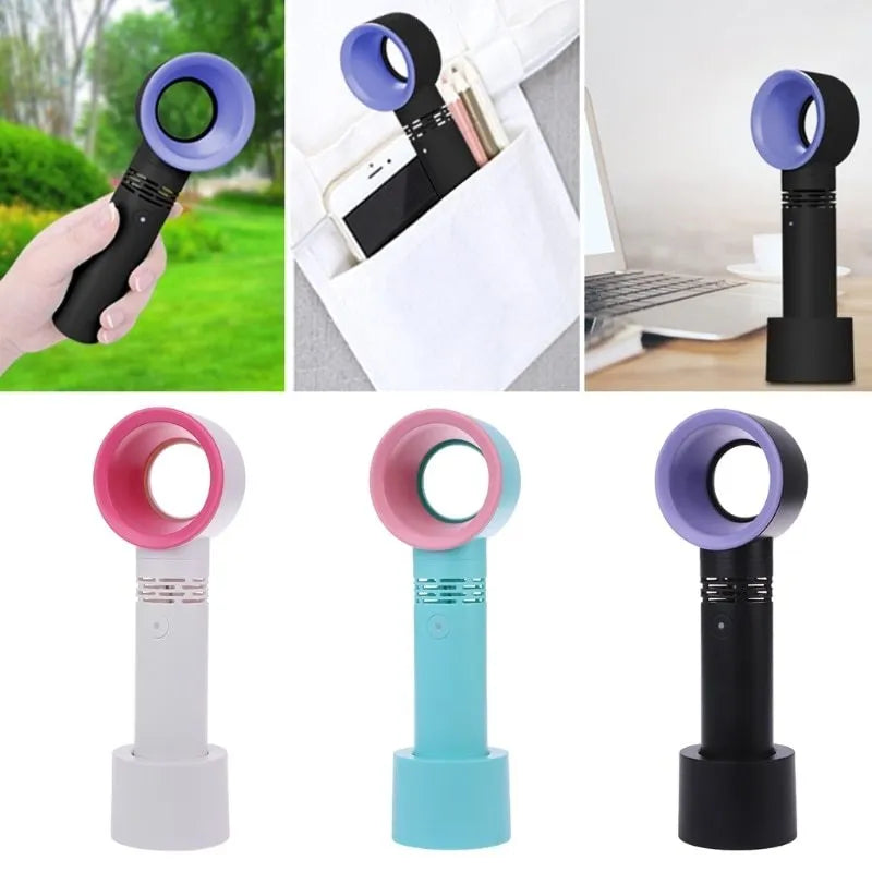 A compact portable bladeless fan with USB cable on a desk.