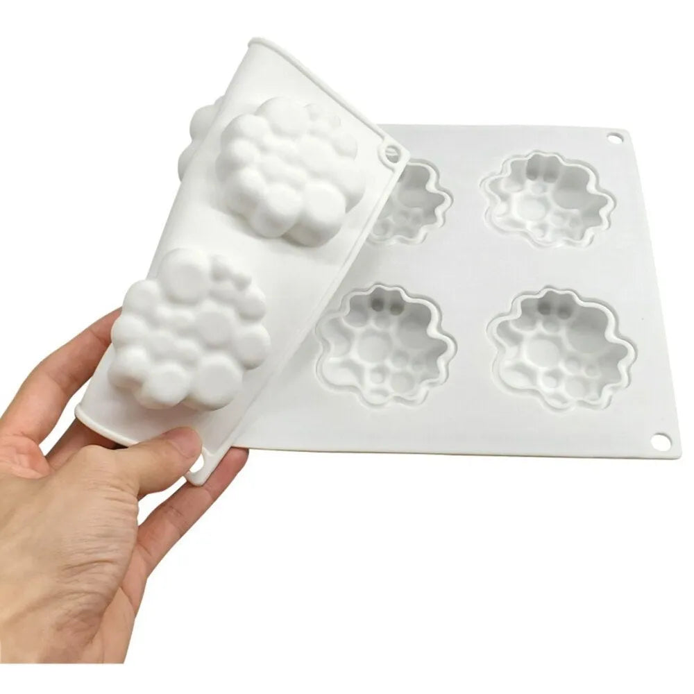 Round silicone cake mould with bubble tower pattern for baking and desserts.