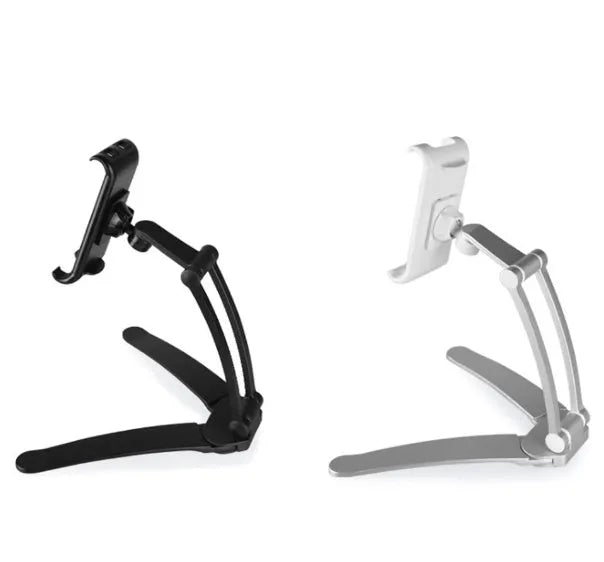 Silver aluminium alloy desktop tablet stand holding a tablet, showing its 360-degree rotation and adjustable chuck mechanism.