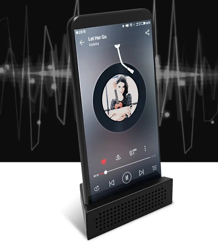 Mini mobile phone amplifier bracket for Apple iPhone on desktop in blue colour