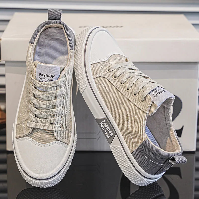 Men's low-top casual canvas shoes in blue with round toe and lace-up front for skateboarding