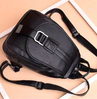 Women's waterproof PU leather backpack in medium size with double straps, available in five colours