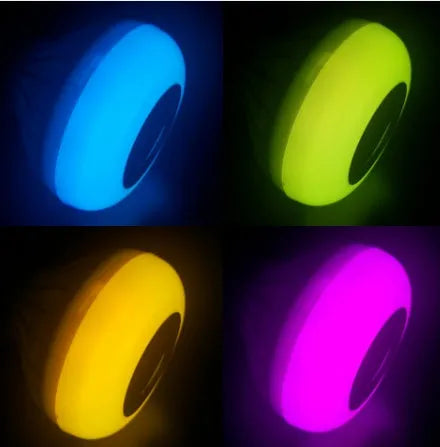 White Bluetooth speaker LED light bulb with E27 screw base for colour changing lighting and wireless audio.