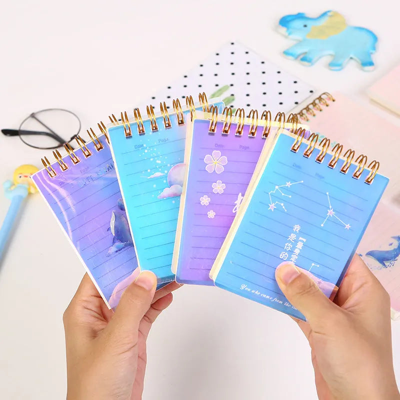 A7 spiral-bound pocket notepad with PP cover in one of four colour series: Cherry Blossom, Constellation, Ocean, or Universe.