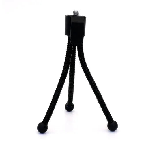Silver iron mini desktop tripod with folded legs and a black universal ball head mount.