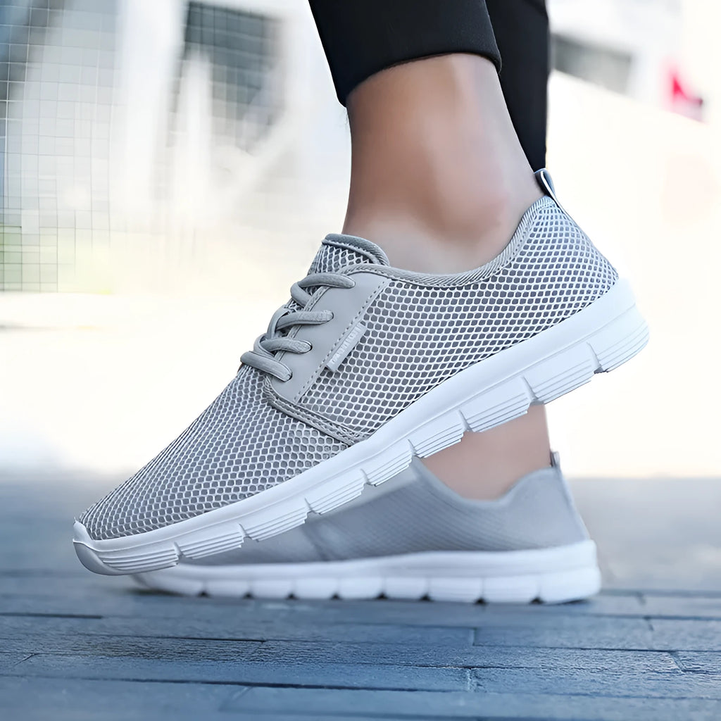 Men's casual running shoes with mesh upper and MD sole in black colour option for summer sportswear