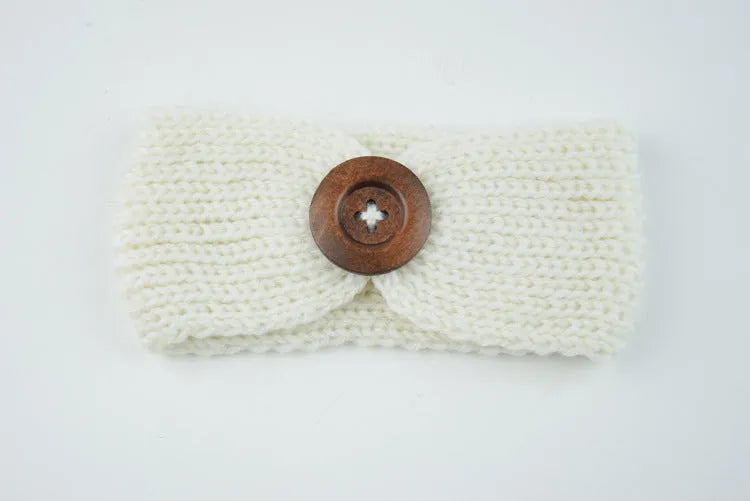 Hand-woven baby wool headband in pink, measuring 8x18 cm, for newborn girls