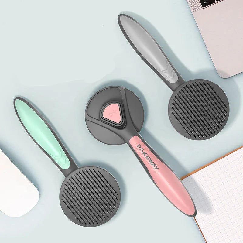 Pet floating hair combing brush in engineering plastic, 193 x 77 x 49 mm, mint green colour, ergonomic handle.