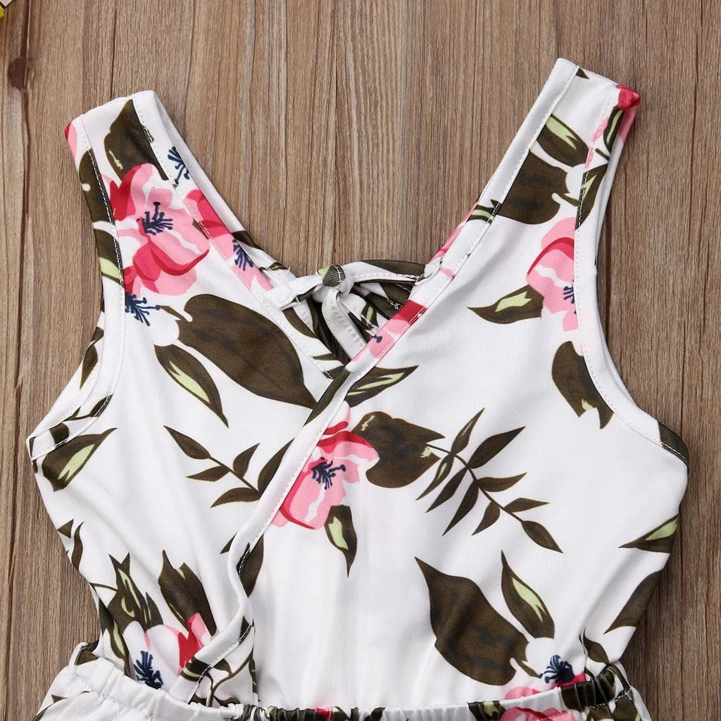 Cotton floral summer outfit for baby girls in white or yellow with sizing from 90cm to 130cm