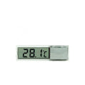 Gold digital stick-on aquarium thermometer on glass tank showing temperature reading