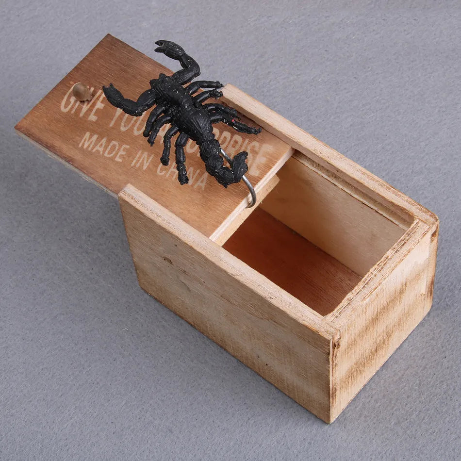 Wooden prank box with jumping scorpion, gecko or mouse for April Fools jokes