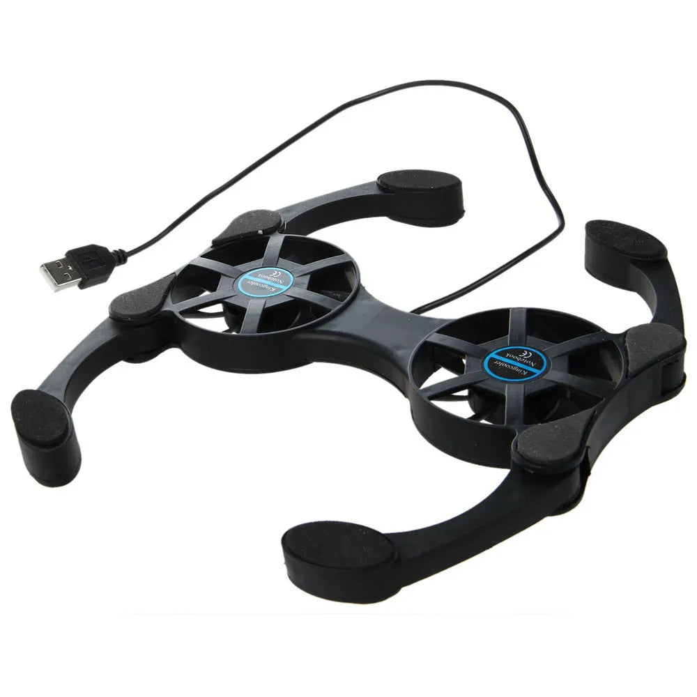 Portable folding cooling base for laptop radiator, black, with two 70mm fans and USB cable, unfolded on surface