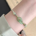 Women's ethnic-style bracelet with jade buckle weaving and double ring design in electroplated copper