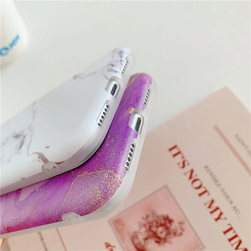 Marble pattern iPhone case with cartoon elements in multiple colour options for 11, 12, X, 7/8 models