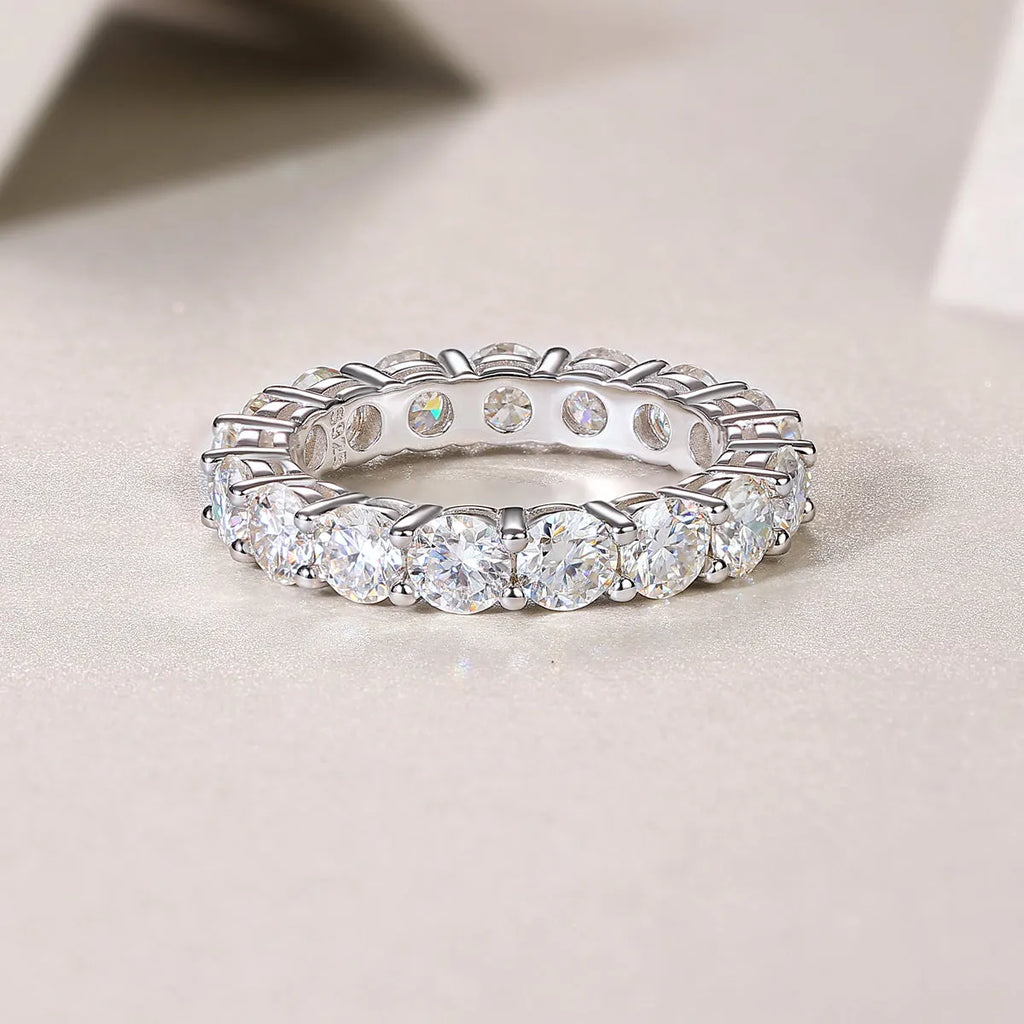 Starlight moissanite wedding ring set in S925 silver platinum plated on display in gift box, available in yellow gold and rose gold