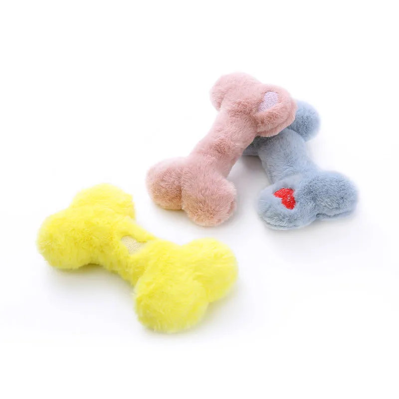 Blue love bone plush dog toy with vocal sound unit and squeaker for interactive chewing play.