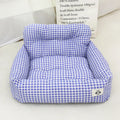 Grey and blue plaid cloth car-mounted dog travel nest shown in two size options.